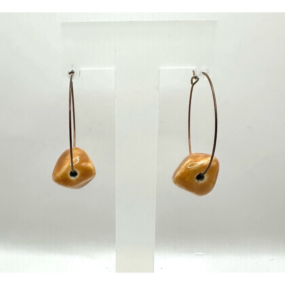 Handcrafted pair of Lightweight hoop earrings, featuring artisan ceramic beads